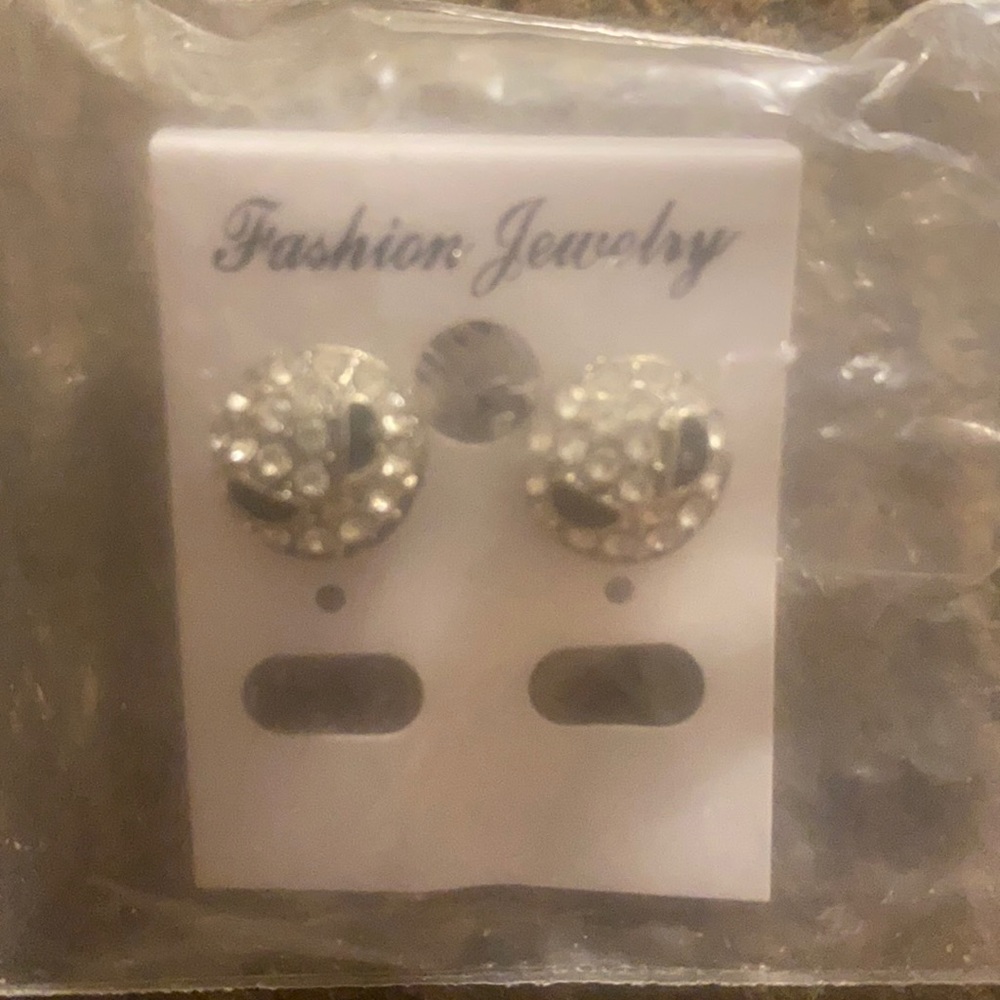 A pair of Jack Skellington earrings never worn.